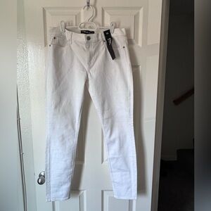 Express mid rise legging jeans. No distressing. NWT! Size 12.